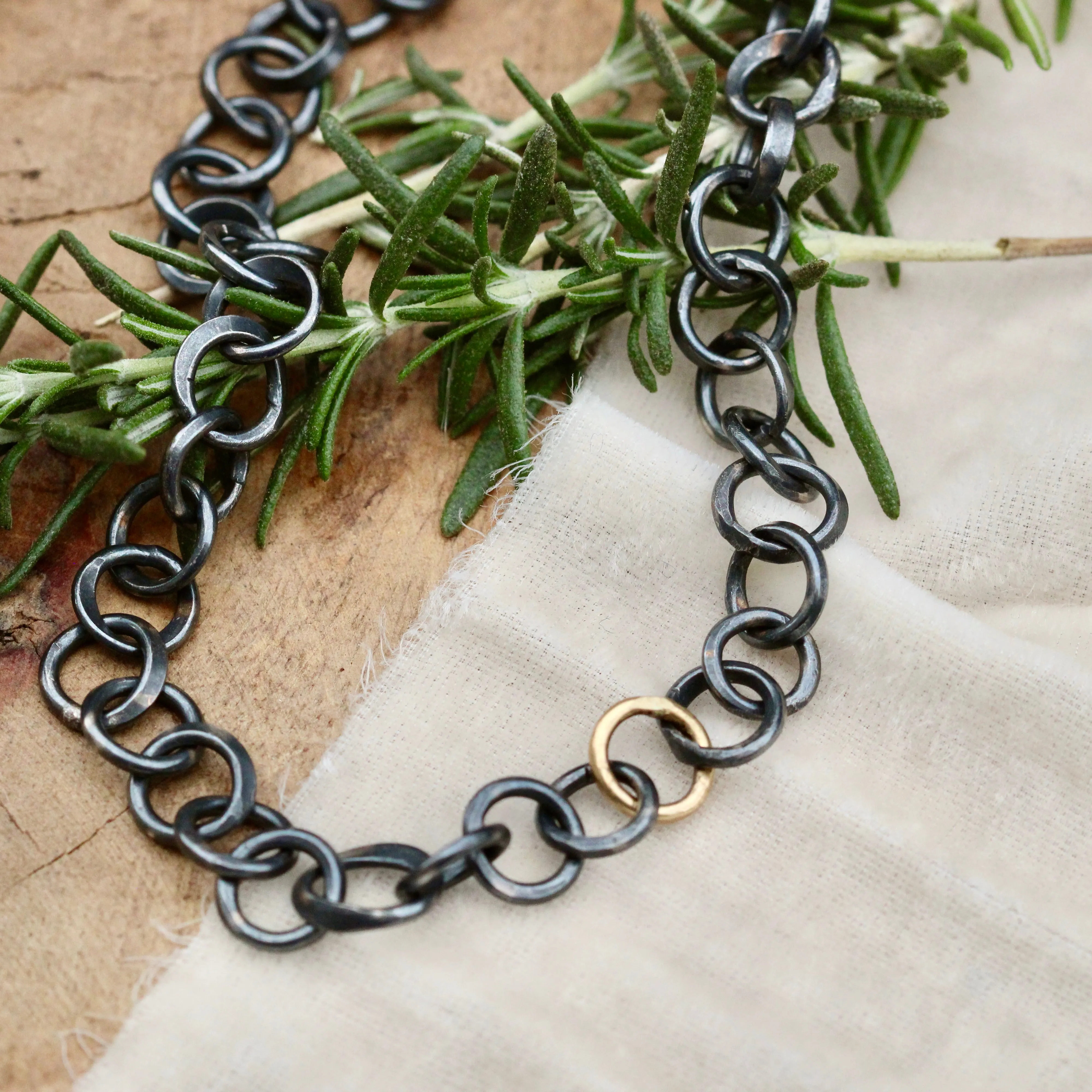 Heavy hand forged sterling silver and 18k yellow gold