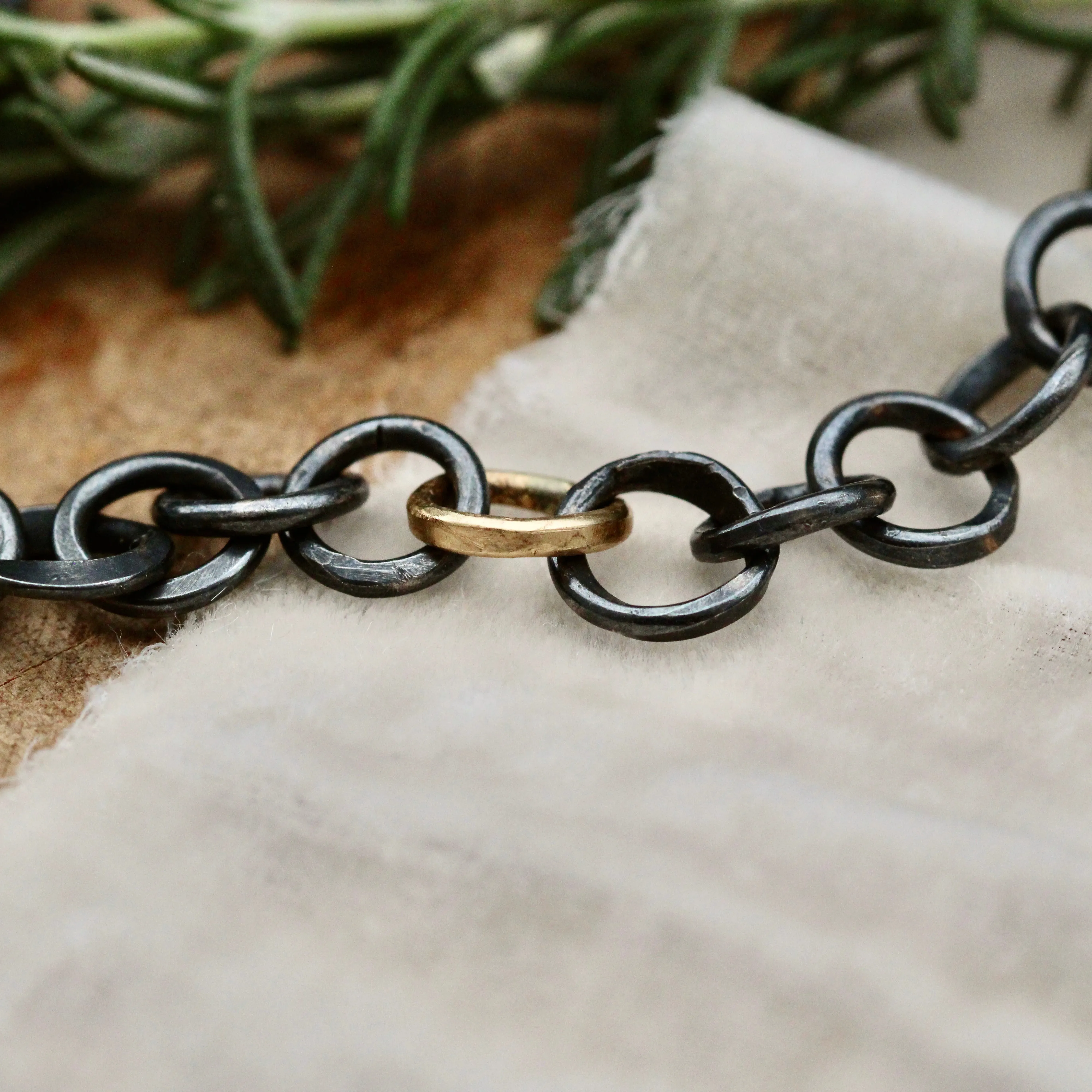 Heavy hand forged sterling silver and 18k yellow gold