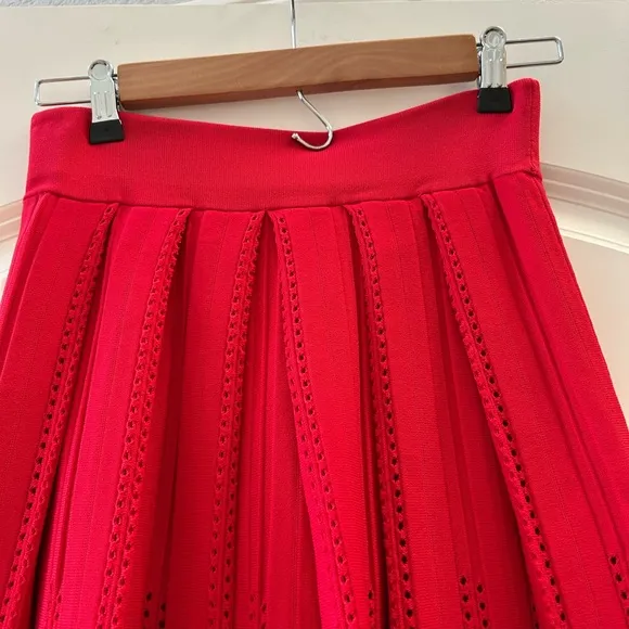 Maje Jubio crochet cut out midi length pleated skirt. US size S. Red. Never worn