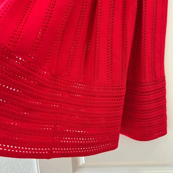 Maje Jubio crochet cut out midi length pleated skirt. US size S. Red. Never worn