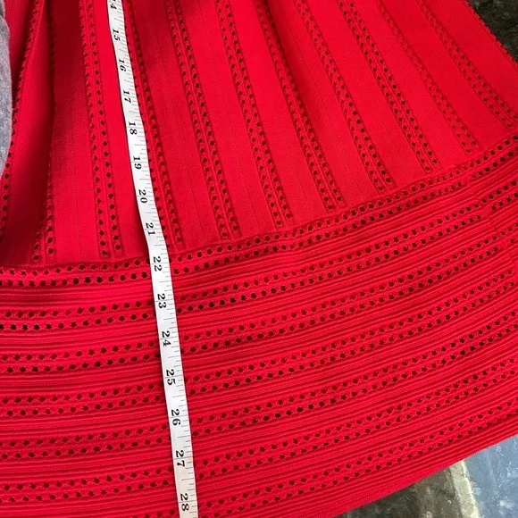 Maje Jubio crochet cut out midi length pleated skirt. US size S. Red. Never worn