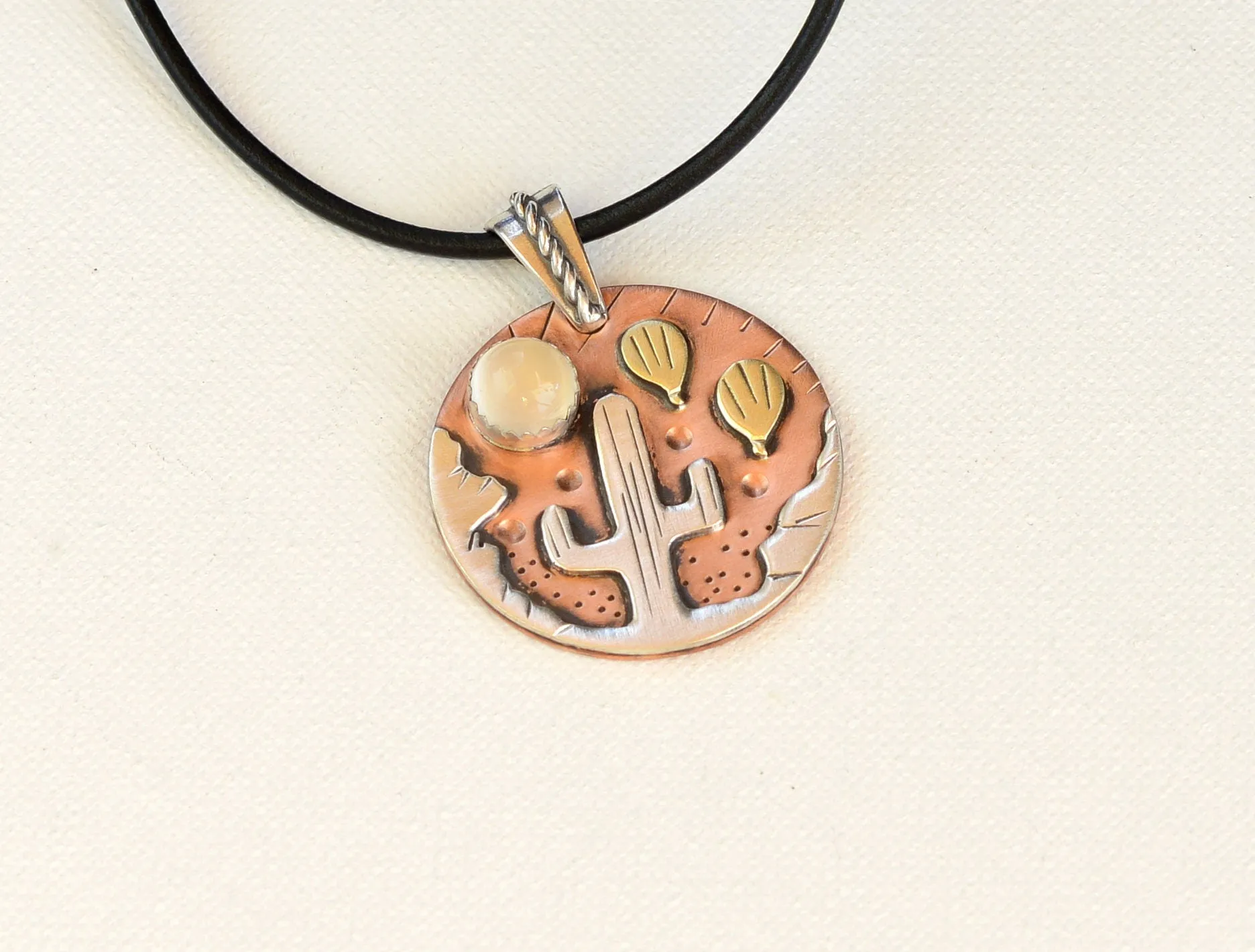 Necklace with Ballooning over the Desert theme