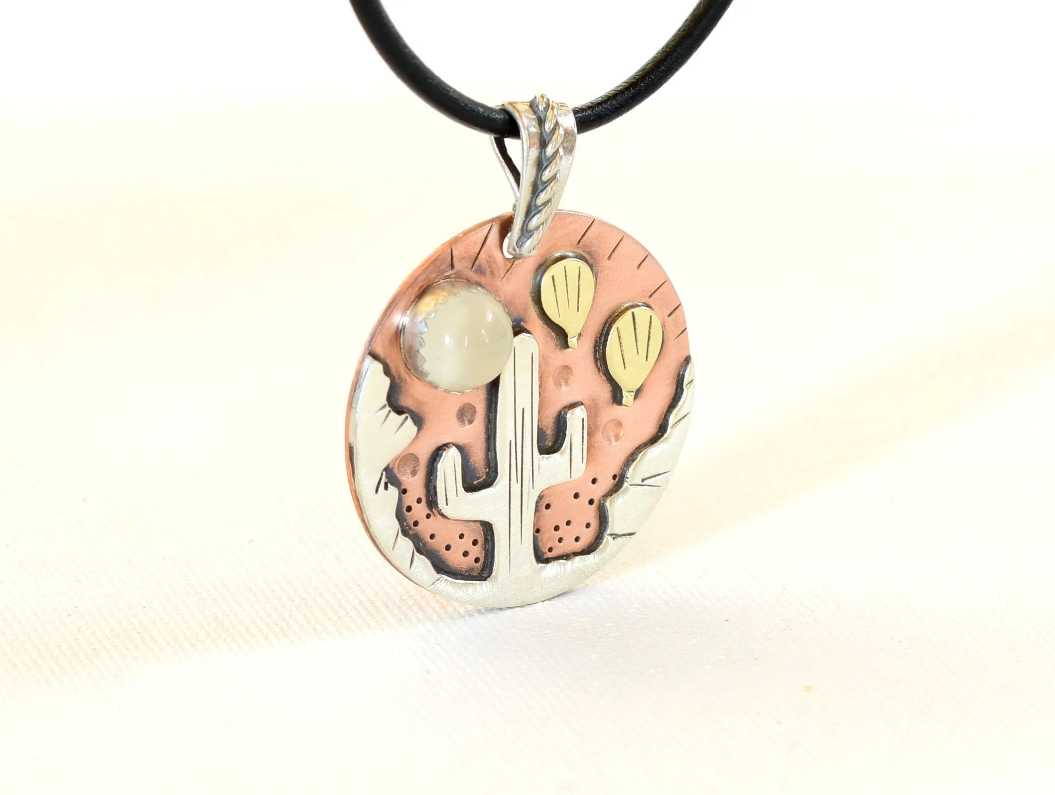Necklace with Ballooning over the Desert theme