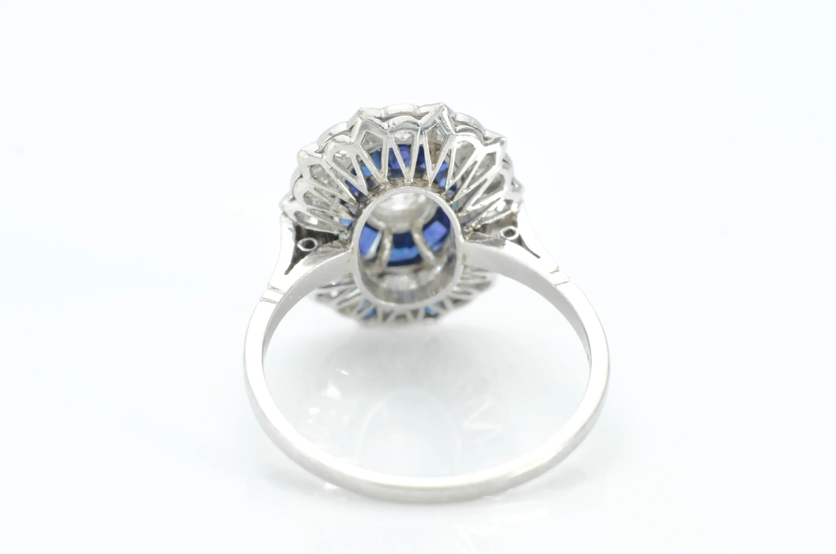 OLD EUROPEAN CUT DIAMOND AND SAPPHIRE TARGET RING.
