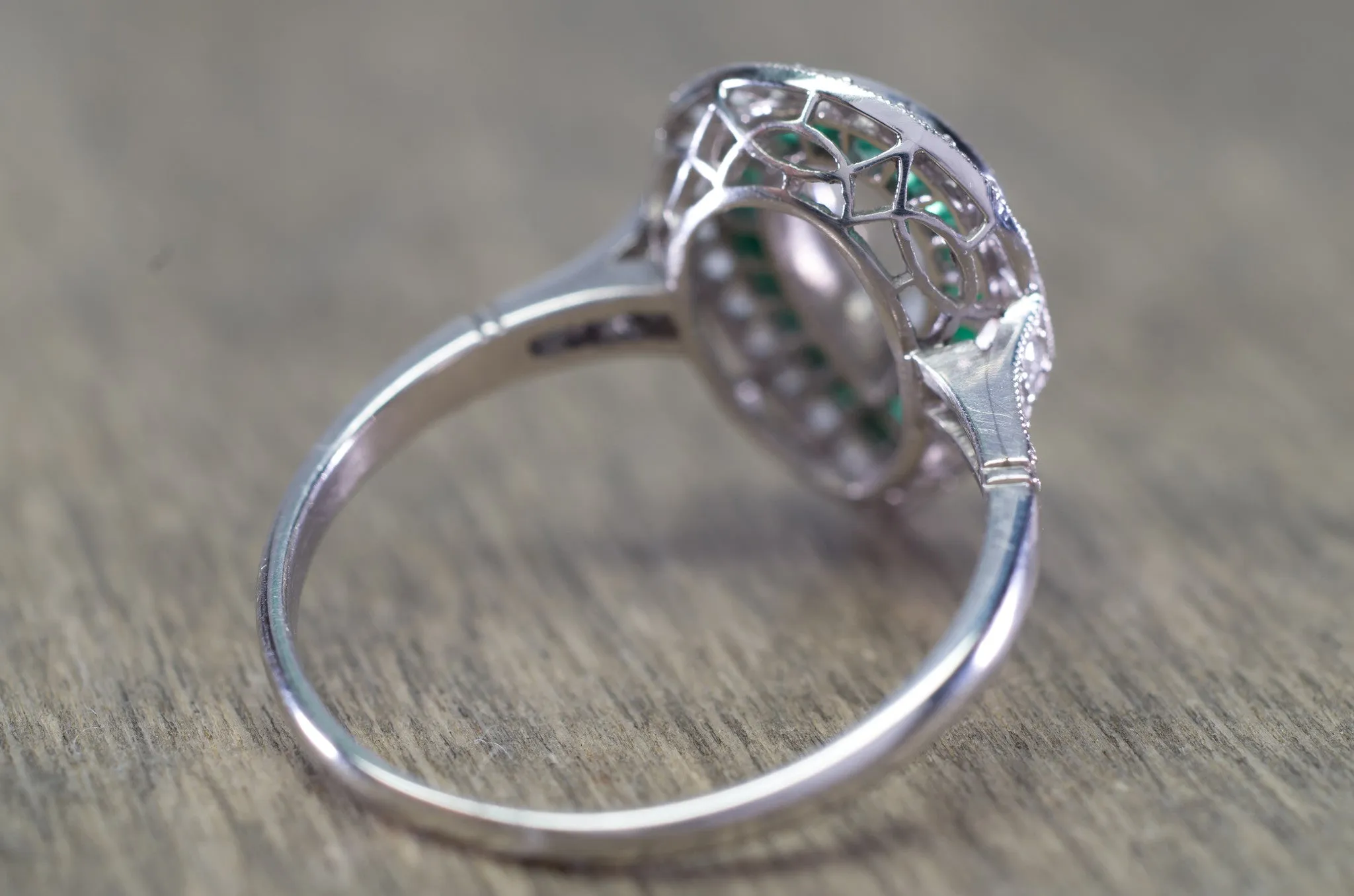 PEAR ROSE CUT DIAMOND AND FRENCH CUT EMERALD RING
