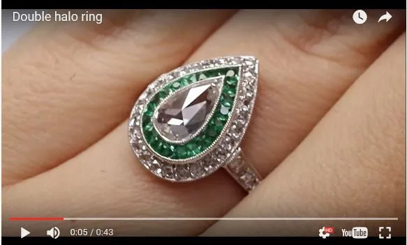 PEAR ROSE CUT DIAMOND AND FRENCH CUT EMERALD RING